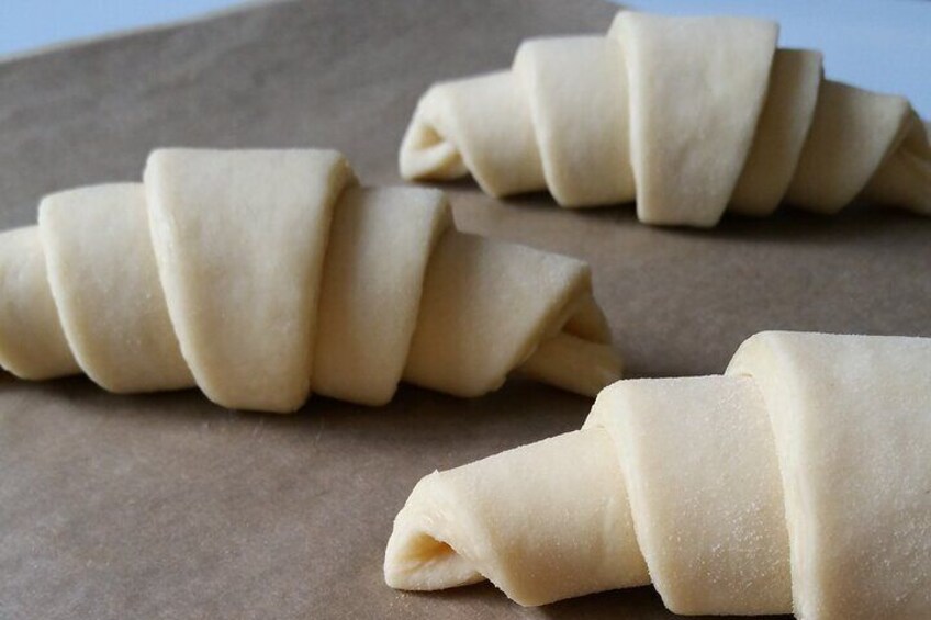 Croissant class Paris : ready to be glazed before baking