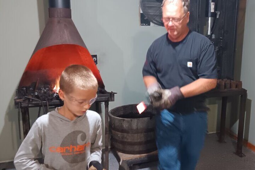 Teagan and Grandpa Steve at the Forge
