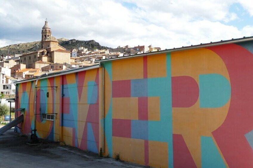 Our oil mill with the Boa Mistura mural, a symbol of Empty Spain.