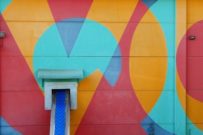 Detail of our oil mill with the Boa Mistura mural, a symbol of Empty Spain. 