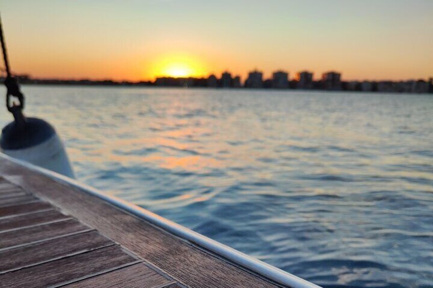 Sailing with sunset and swimming in the sea