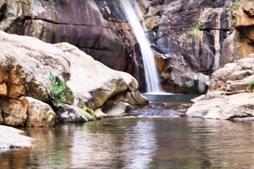 In summer take a swim in the lake at the waterfall