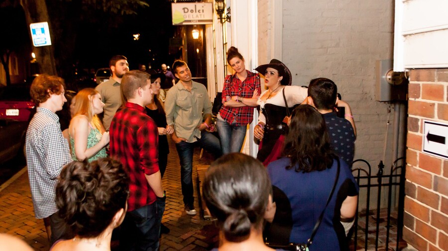 Guide outside a pub leads group