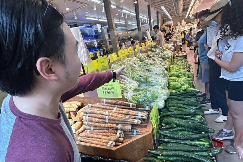 showing produce in Asian grocery store