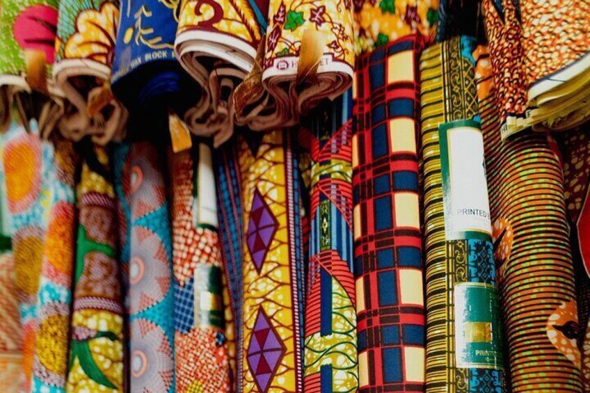 "Immerse yourself in the vibrant world of African print fabrics on our Accra Textiles and Fashion Tour! Discover the stories and meanings behind these stunning designs. #AfricanPrints #FashionTou