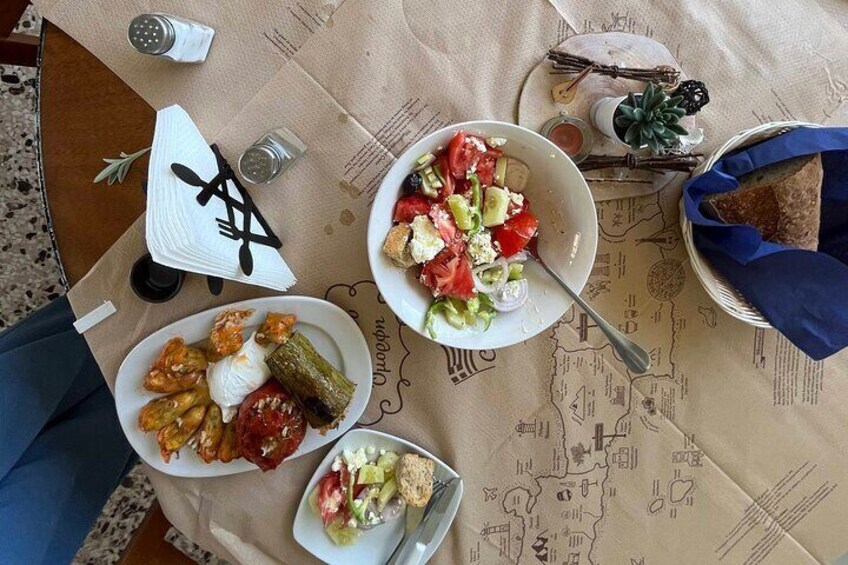 A Table for two, with Salad, Appetizers & The cooked dish