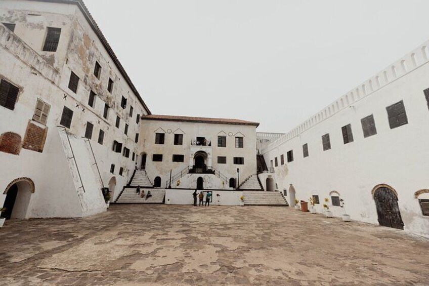 "Explore the historic interior of Elmina Castle, where echoes of the past tell the stories of the slaves once housed here. A poignant piece of Ghana's heritage. #ElminaCastle #SlaveTradeHistory"