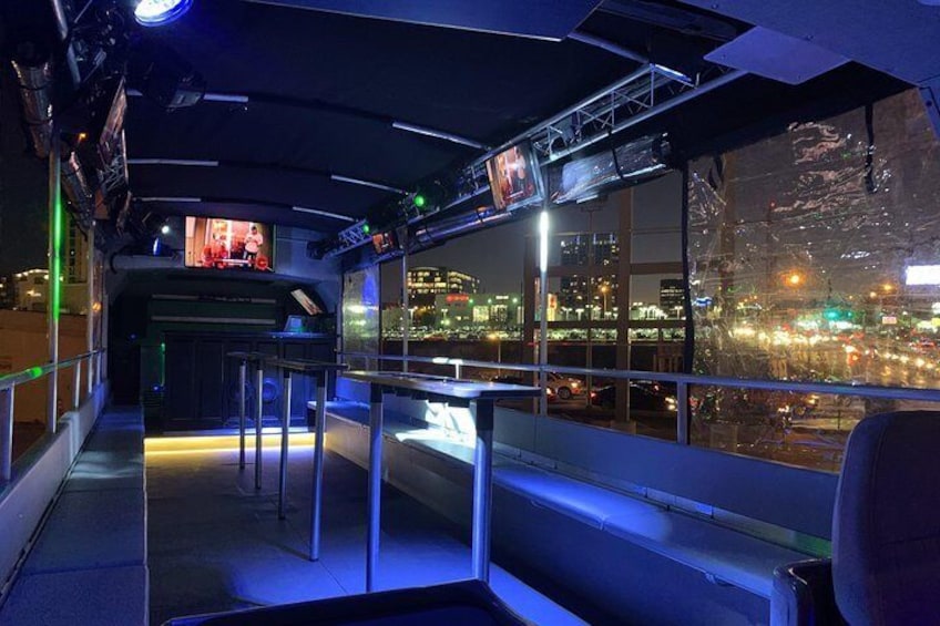 Cozy Boat Leather Seating that Folds Away - Huge Dance Floor. 7 TV's to Display Music Videos - Onboard Refrigeration. Bartender & DJ - Canvass Top w' Windows for Inclement Weather.