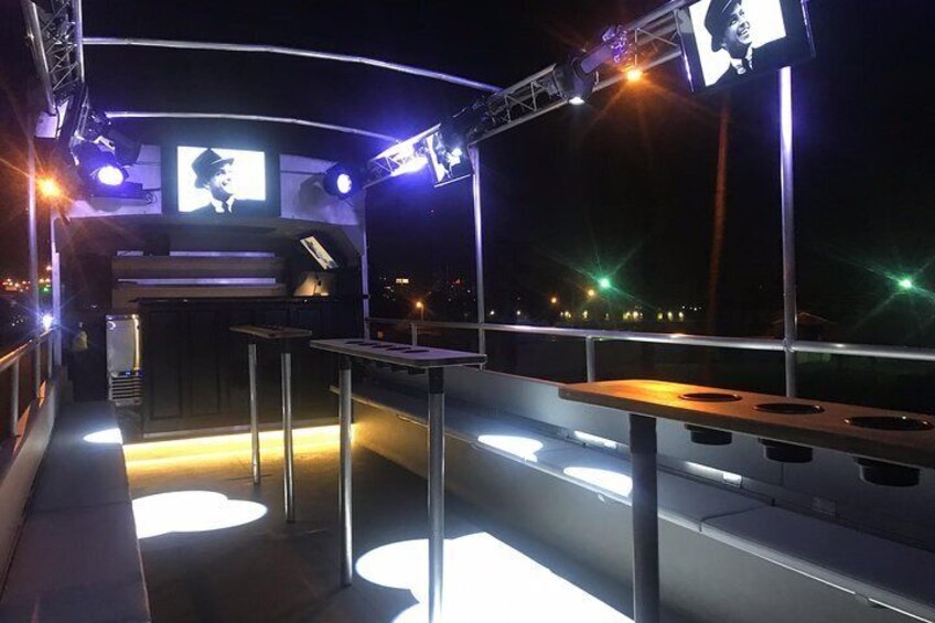 8 Professionally Calibrated Concert Lights & 2 Fog Machines. 7 Tv's to display music videos.