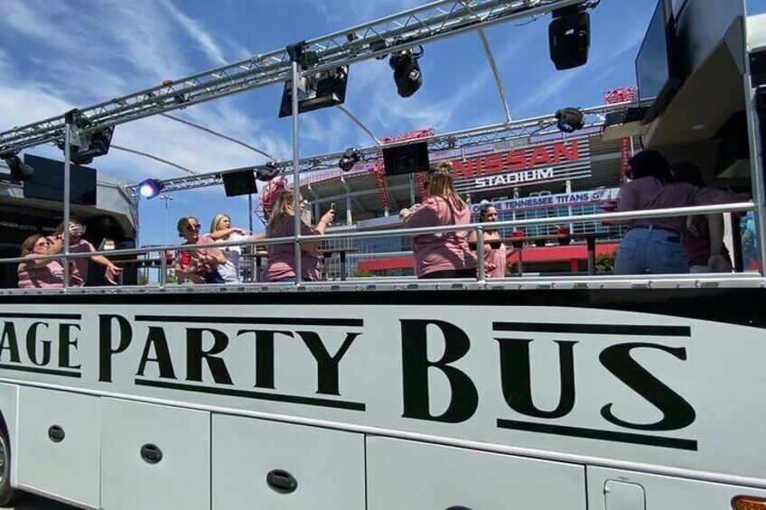 Upstage Party Bus is the only open-air coach bus in the world! There is no better form of ground transportation than a coach bus!