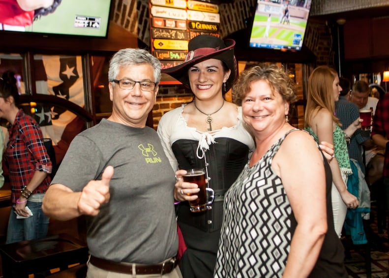 Group smiling on the Haunted Pub Tour in San Antonio 