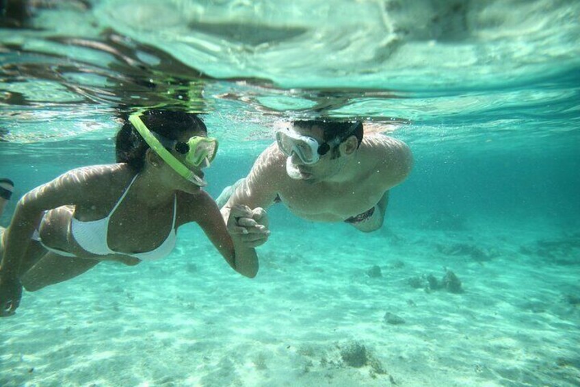 Discover Isla Mujeres: Catamaran, Snorkel & Open Bar!