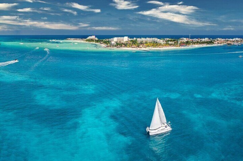 Discover Isla Mujeres: Catamaran, Snorkel & Open Bar!