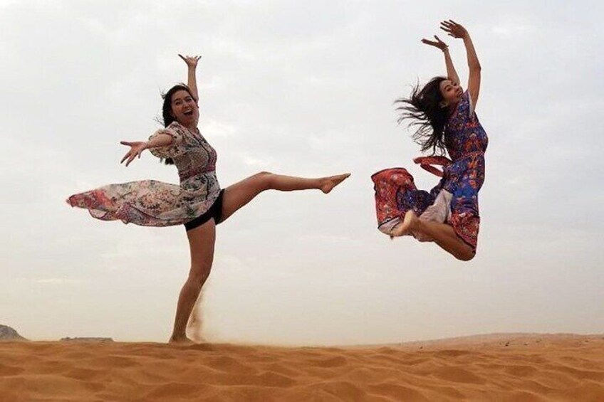 Red Dunes Desert Safari with BBQ Dinner, Camel Riding & Live Show