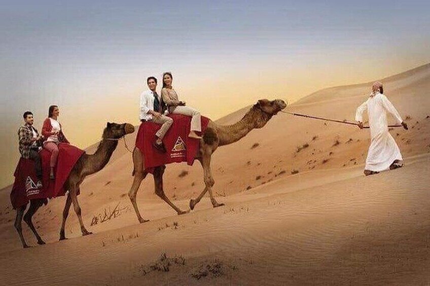 Red Dunes Desert Safari with BBQ Dinner, Camel Riding & Live Show