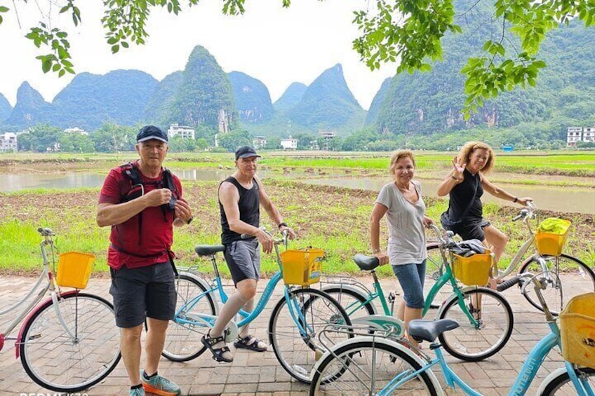 We are enjoying yangshuo rural scenery cycling