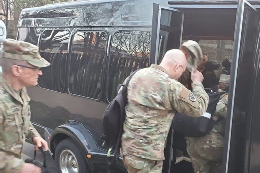 Proudly transporting U.S. soldiers aboard on our 13 passenger minibus.