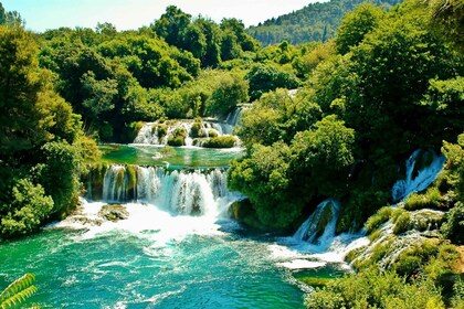 From Zadar: Krka Waterfalls Day Tour with Boat Ride & Guide