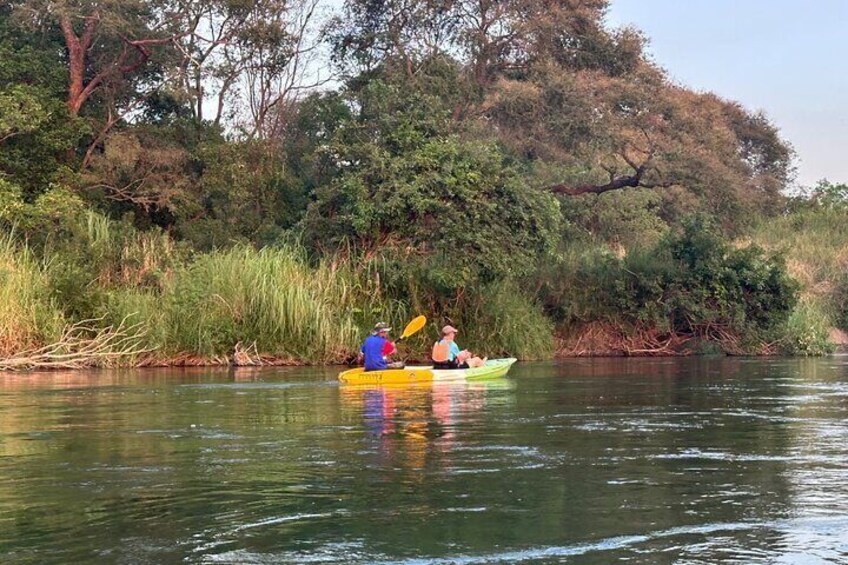 Customers kayaking in Mekong River, Stung Treng province, Cambodia . They enjoy the beautiful nature of Mekong River Cambodia.