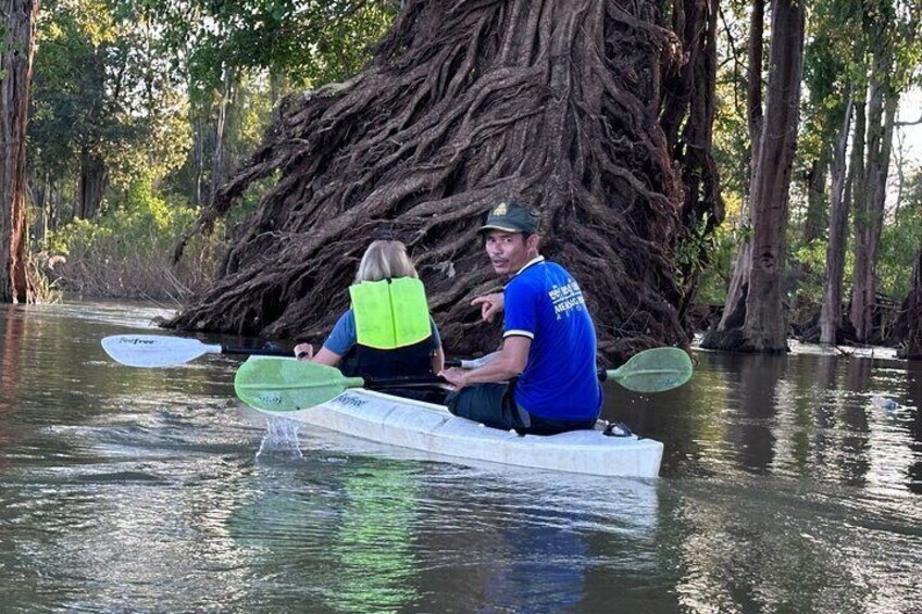 Customers kayaking in Mekong River, Stung Treng province, Cambodia . They enjoy the beautiful nature of Mekong River Cambodia.