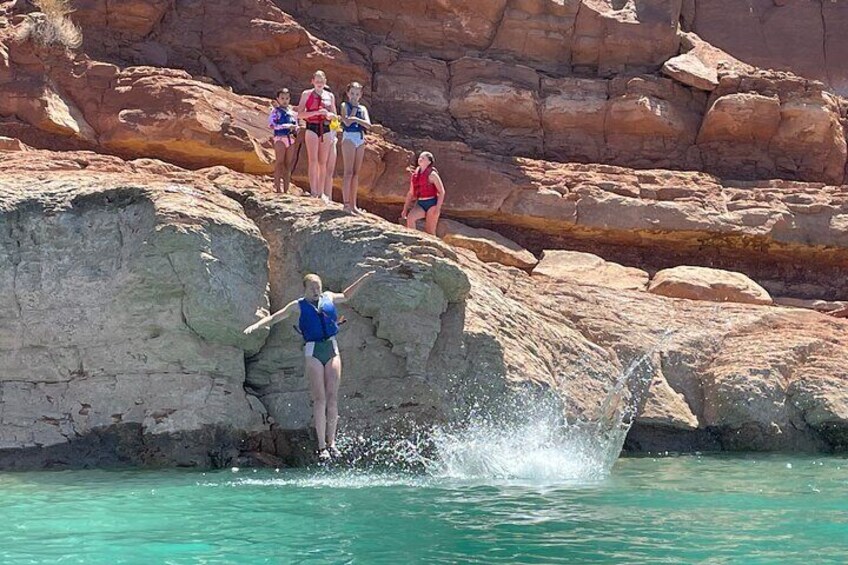 Yes, you can jump off of the cliffs and rocks!