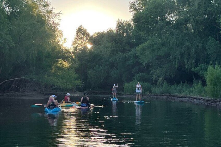 The creek channel at sunset. Kayaks or stand up paddleboards may be used.