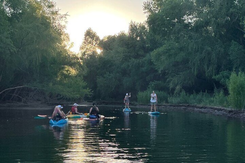 The creek channel at sunset. Kayaks or stand up paddleboards may be used.