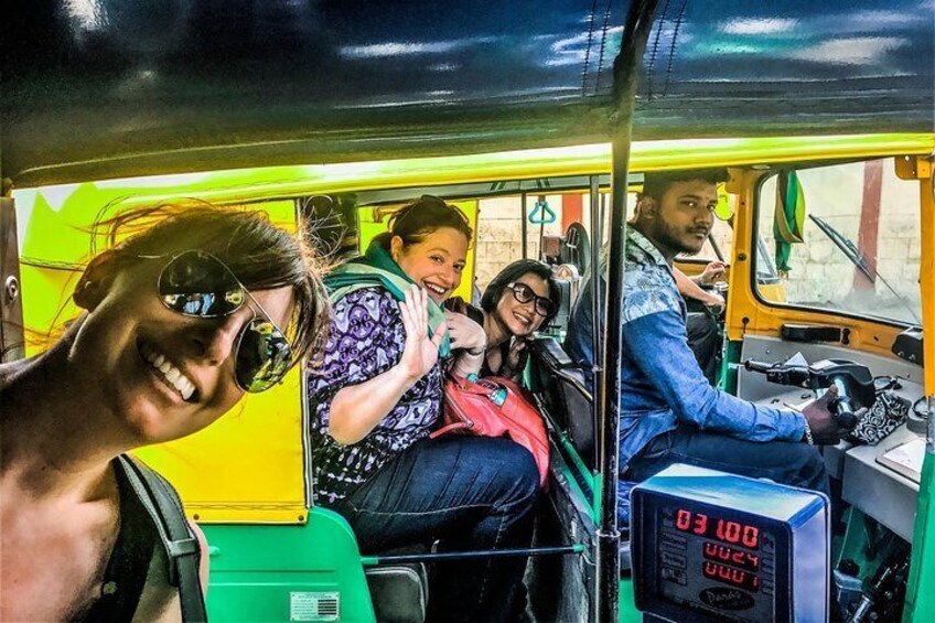 Guests on a tour in a tuk-tuk