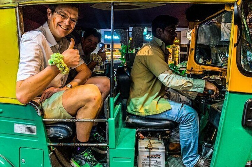 Guests in a tuk-tuk after the temple visit