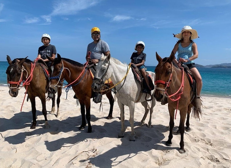 Horseback riding on the beach