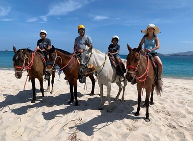 Horseback riding on the beach