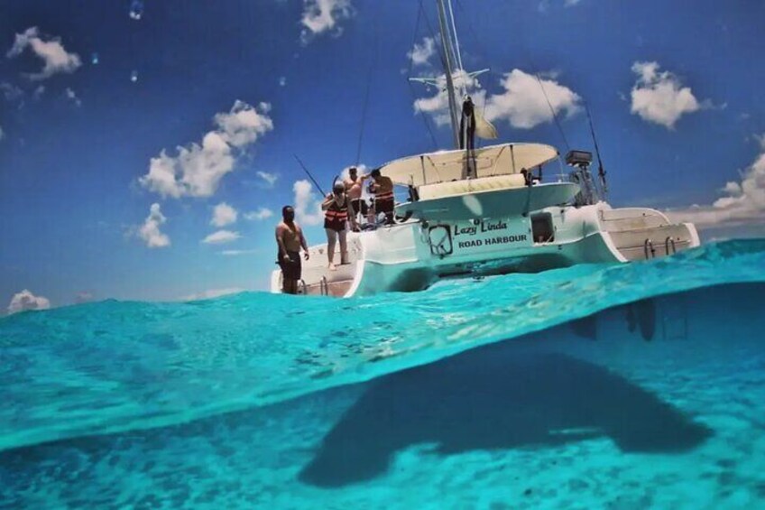Experience luxury on the Lazy Linda, a 46 ft catamaran, perfect for snorkeling and relaxation in Riviera Maya