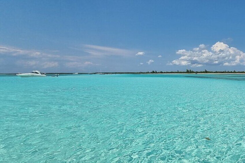 Experience the stunning turquoise waters surrounding Xpu-Ha Beach