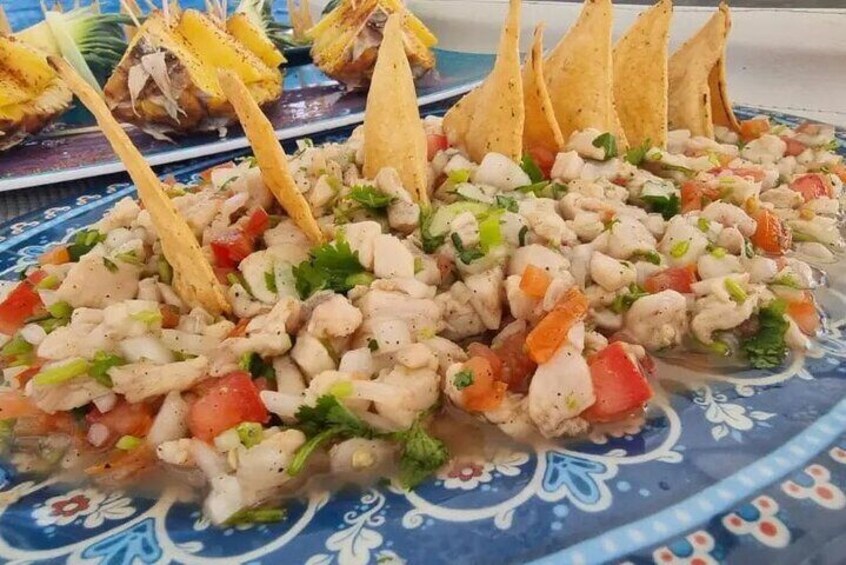 Ceviche Perfection: Savor the freshness of our expertly crafted ceviche, a perfect blend of flavors to complement your day on the water
