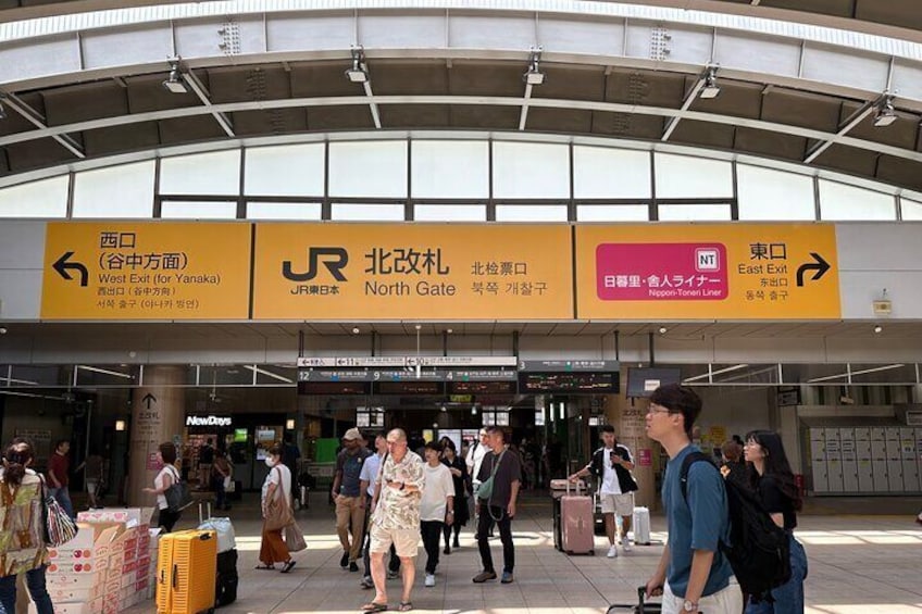 Meeting point . When you reach Nippori Station , go to North Gate , then go out to West Exit (for Yanaka)