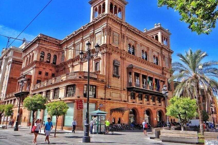 Stroll ahead of the great buildings of Seville.