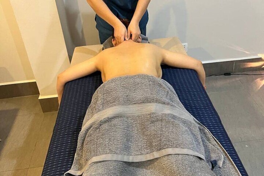 Women customer having an aromatherapy massage.