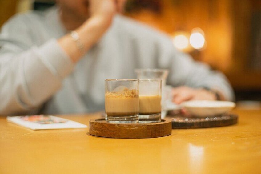 Participant savoring the rich flavors of freshly brewed Turkish coffee at the workshop.