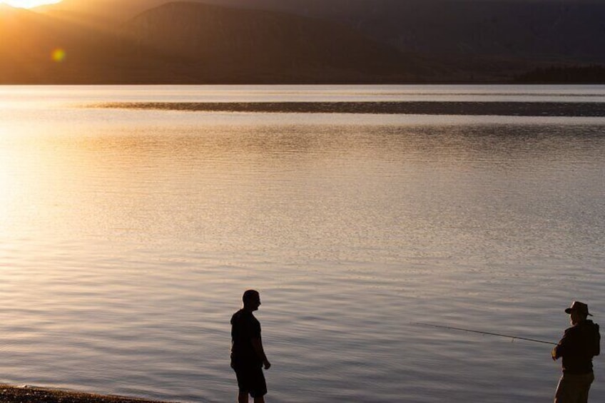 Fishing under the sunset