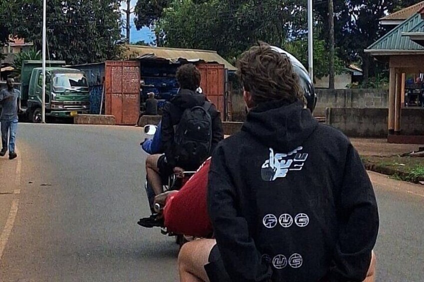 Our clients on a bike (Bodaboda)