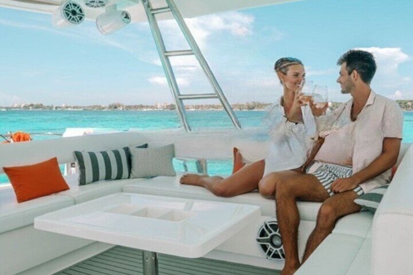 Couple enjoying the luxurious seating on Leopard 51 ft PowerCat