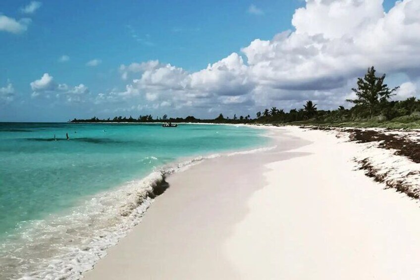 Discover hidden beaches accessible only by boat along the Riviera Maya