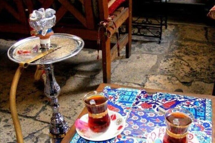 Relieve the tiredness of the day by drinking tea/coffee and smoke hookah at Çorlulu Ali Pasha Madrasa