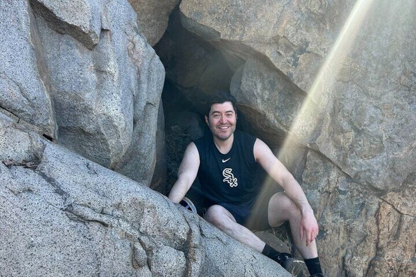 Tour Participant enjoying the top of the mountain