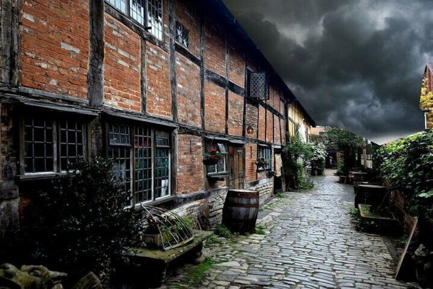 Enter via the ancient cobbled courtyard