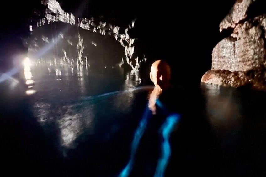 Inside Piul Cave - notive blue tint on legs