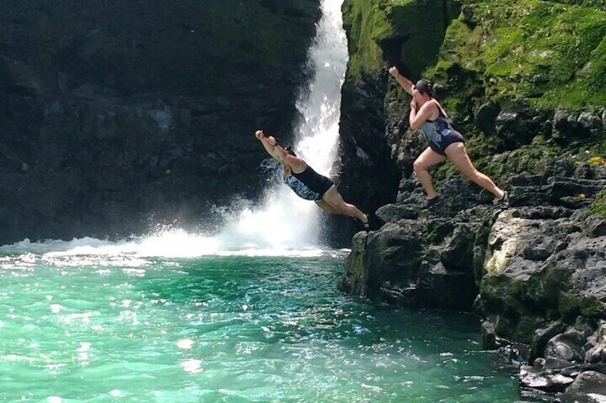 Taking a Plunge at Sauniatu Falls