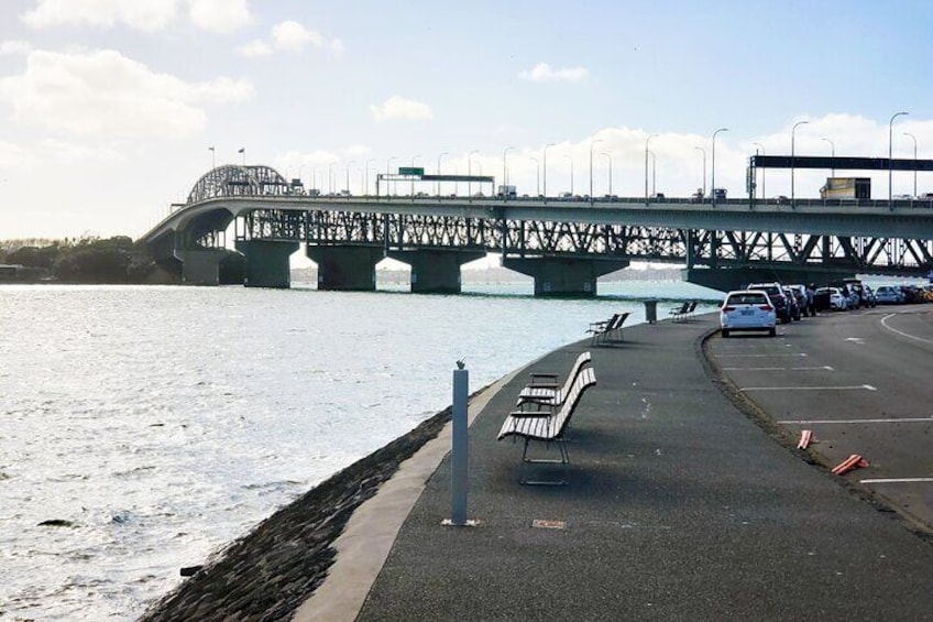 The Auckland Harbour Bridge, completed in 1959, is an iconic structure in Auckland, reminiscent of the Sydney Harbour Bridge in design.