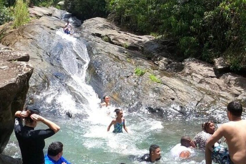 El Yunque Rainforest Party Tour with Waterslide and Rope Swinging