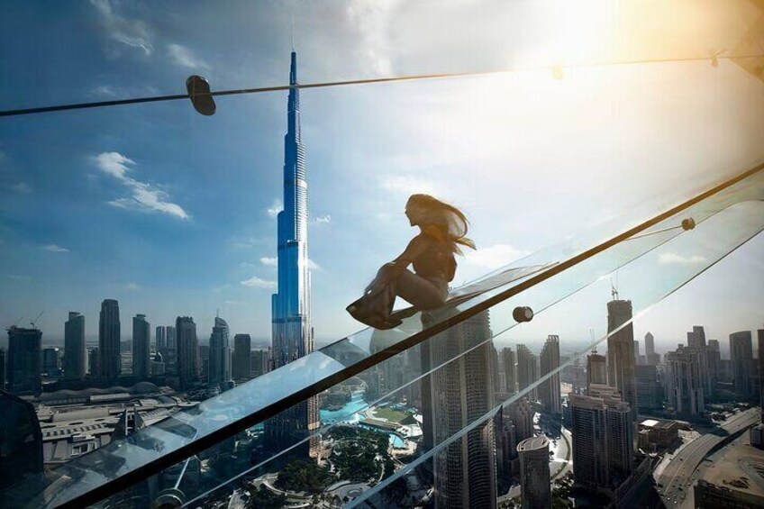 Feel the adrenaline rush as you slide down the thrilling Glass Slide at Sky View Observatory, with the iconic Burj Khalifa as your backdrop.